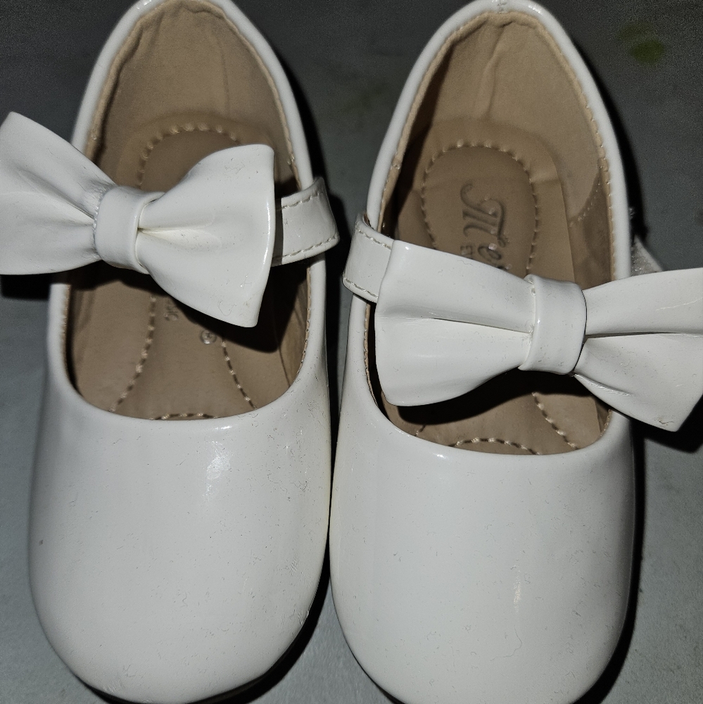 White ballet flats